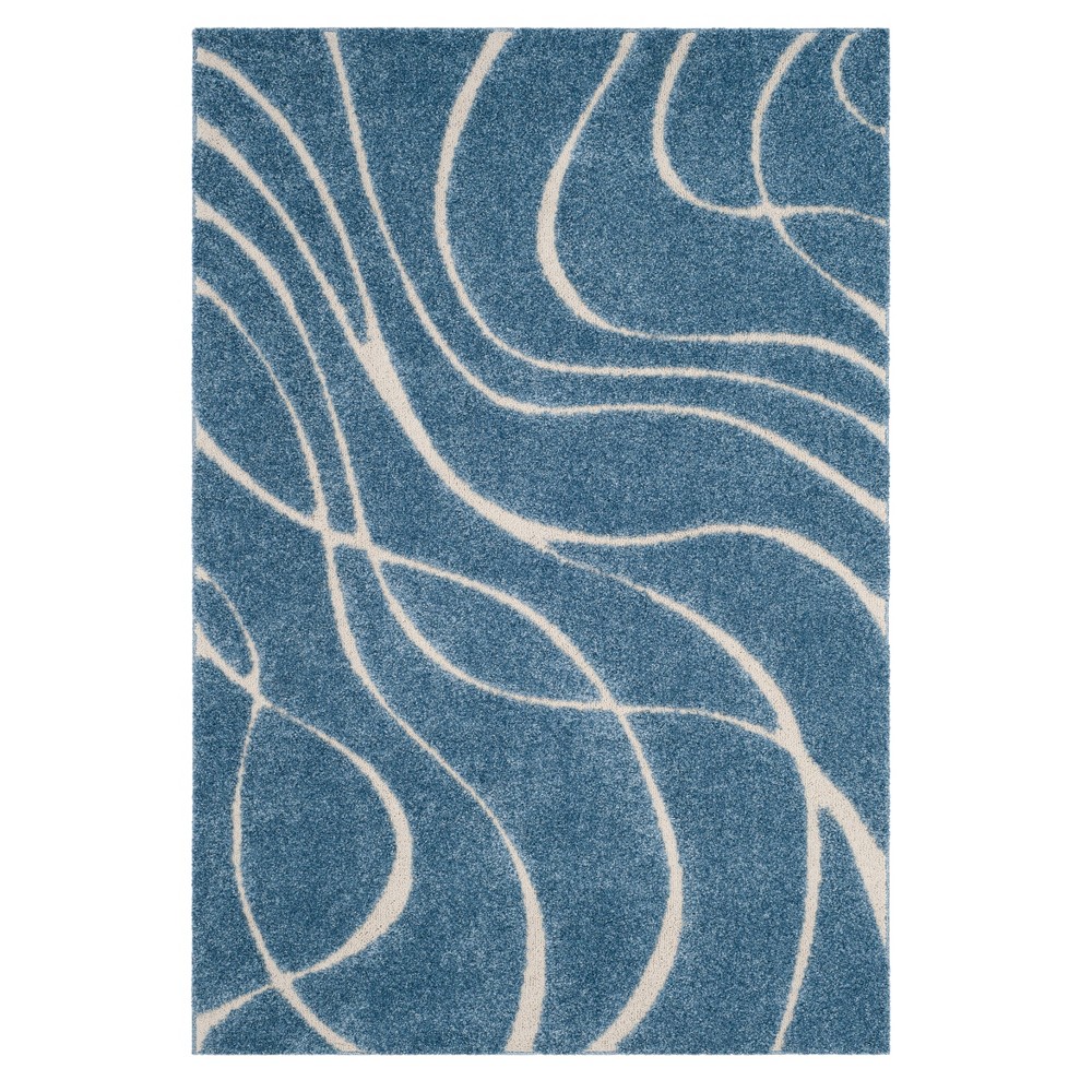 5'3inx7'6in Light Blue/Cream Swirl Loomed Area Rug - Safavieh