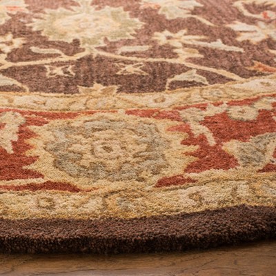 Handmade Round Olive and Rust Wool Tufted Area Rug