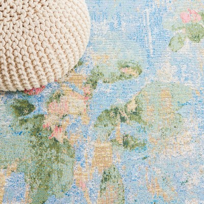 Reversible Light Blue Synthetic 4' x 6' Stain-Resistant Area Rug