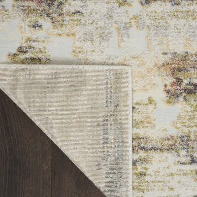 Ivory Abstract 6' x 9' Synthetic Area Rug