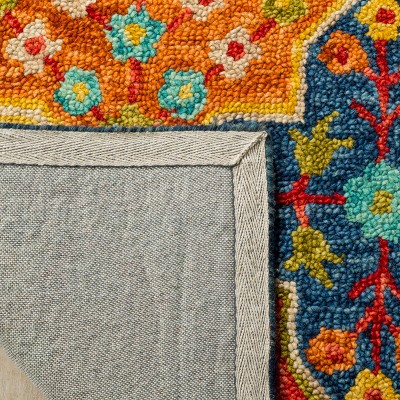 Handmade Blue and Orange Geometric Wool Area Rug, 6' x 9'