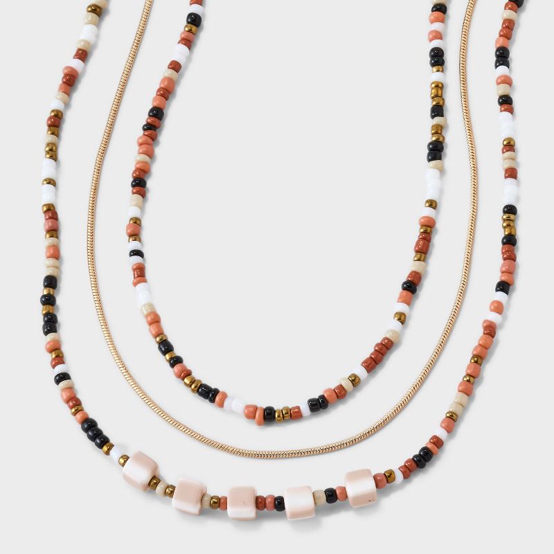 Mini Beaded and Disc Charm Layer Necklace - Universal Thread&#8482; Natural, 1 of 10