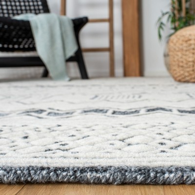 Hand-Tufted Artisanal Wool Blend 8' x 10' Black and Ivory Rug