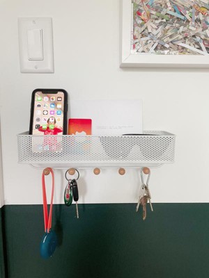 Umbra estique wall outlet organizer