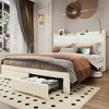 Vlsrka Queen Bed with LED lights and charging station, upholstered headboard with drawers, nightstand, and reading lamp. - 3 of 4