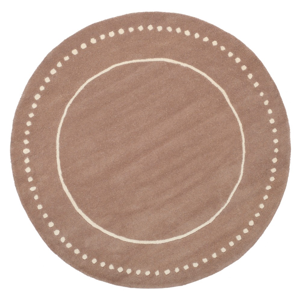 5' Solid Round Area Rug Beige/Ivory - Safavieh