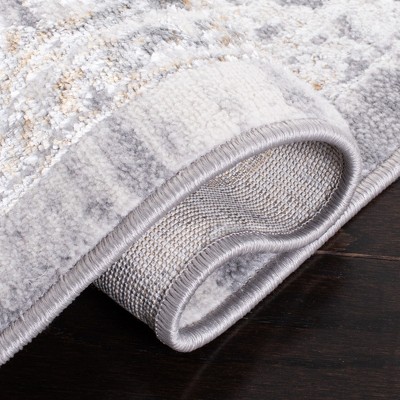 Abstract Gray and Gold 4'5" x 6'5" Synthetic Area Rug