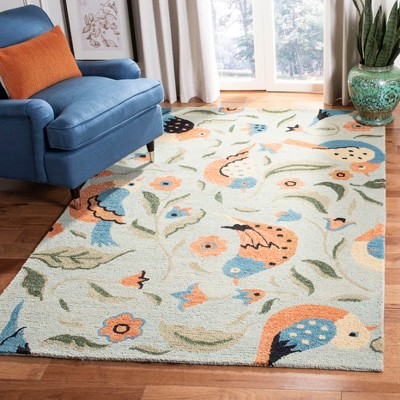 Handmade Blue Floral Wool 4' x 6' Area Rug