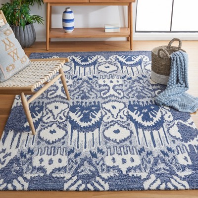 Handmade Blue and Ivory Tufted Wool Rectangular Rug