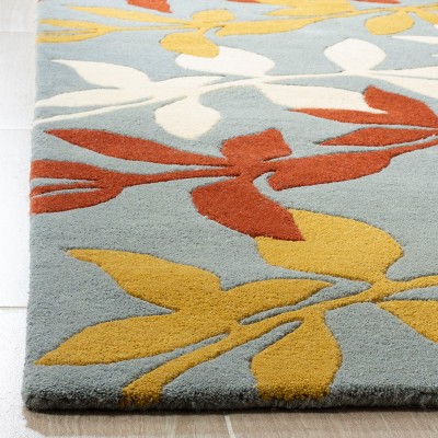 Handmade Tufted Blue and Multicolor Wool Area Rug
