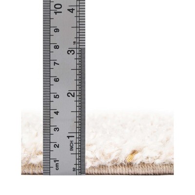 Ivory Rectangular 5' x 7' Solid Shag Synthetic Rug