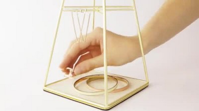 Matte Brass Steel Pyramid Jewelry Stand with Linen Base
