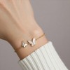Anna-Kaci Women’s Butterfly Chain Bracelet with Delicate Wing Silhouettes and Minimalist Linked Design for a Soft Feminine Accent - Gold - 4 of 4