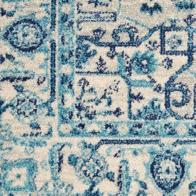 Ivory and Navy Synthetic 5' x 7' Rectangular Area Rug