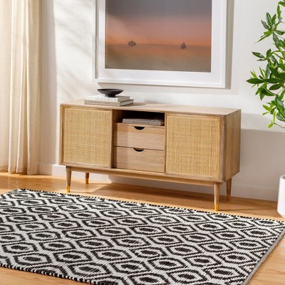 Handmade Black and Ivory Braided Synthetic Area Rug 5' x 7'