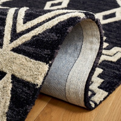 Handmade Black and Ivory Wool Abstract Area Rug