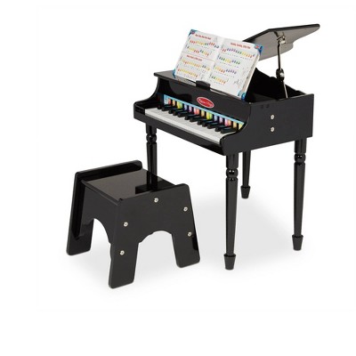 Photo 1 of Melissa  Doug Learn-To-Play Classic Grand Piano With 30 Keys, Color-Coded Songbook, and Non-Tip Bench