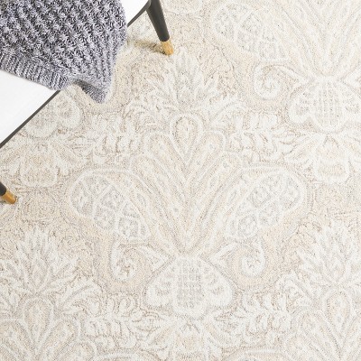 Elegant Ivory Wool Hand-Tufted 4' x 6' Area Rug