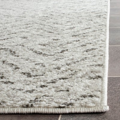 Ivory Charm Hand-Knotted Easy-Care Synthetic Area Rug