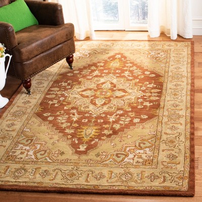 Handmade Tufted Blue Wool 6' x 9' Area Rug