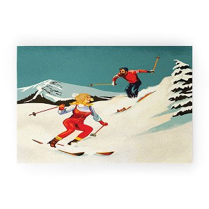 The Whiskey Ginger Retro Skiing Couple Welcome Mat - Society6 - 1 of 4