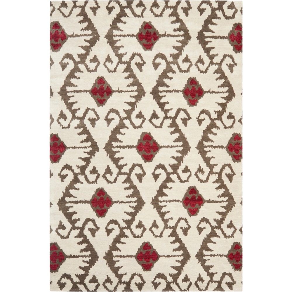 6'X9' Geometric Design Tufted Area Rug Ivory/Brown - Safavieh