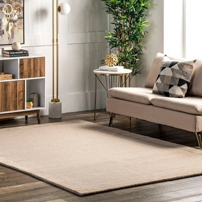 Beige Handmade Wool 4' x 6' Tufted Area Rug