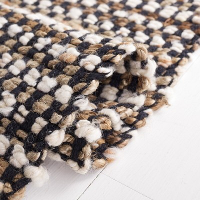 Handmade Black and Ivory Wool Flat Woven Area Rug