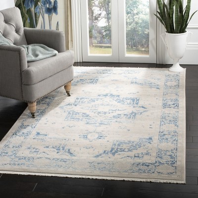 Ivory and Blue Hand-Knotted Synthetic 4' x 6' Area Rug
