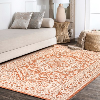 Sinjuri 4' x 6' Orange/Cream Synthetic Medallion Rug