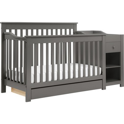 gray crib with changing table