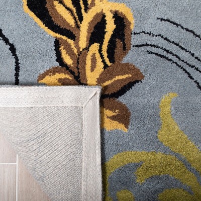 Handmade Tufted Blue and Multicolor Wool Area Rug
