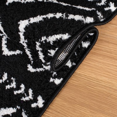 Geometric Black/Ivory Synthetic 8' x 10' Hand-knotted Area Rug