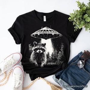Funny UFO Raccoon T-Shirt, Black Unisex Tee for Alien Enthusiasts| OrnamentallyYou - 1 of 4