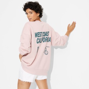 Women's Oversized Graphic Sweatshirt - Wild Fable™ - 1 of 3