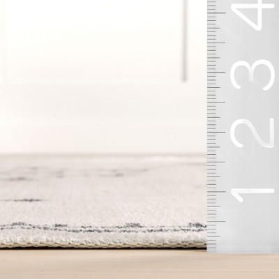 Cream Southwestern 16x10 Washable Synthetic Area Rug