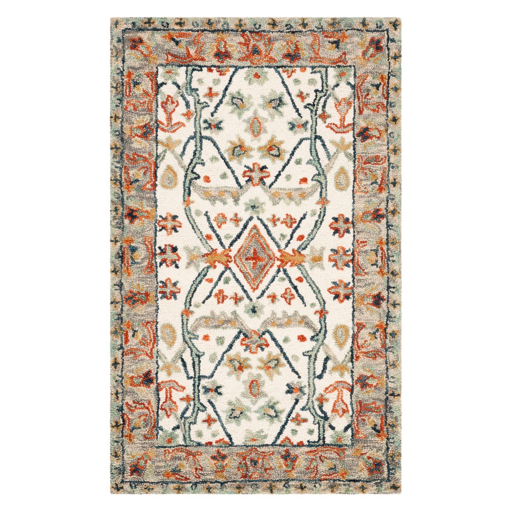 3'x5' Floral Tufted Accent Rug Ivory/Blue - Safavieh