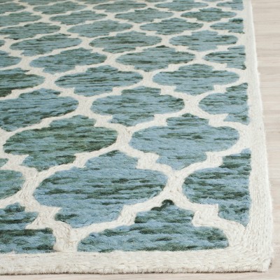 Turquoise and Ivory Hand-Knotted Wool Area Rug