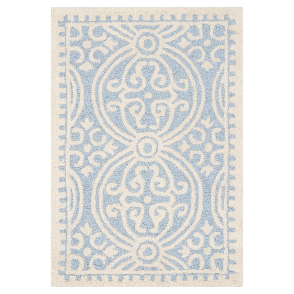 Light Blue/Ivory Quatrefoil Design Tufted Accent Rug 3'x5' - Safavieh