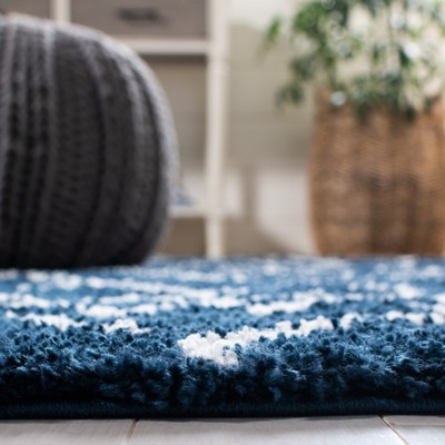 Ivory and Navy 8' x 10' Synthetic Shag Area Rug
