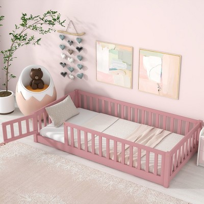APRILSOUL Pink Twin Floor Platform Bed with Fence, Safety Door and 7-Slat Pine Frame, Kid-Friendly Design