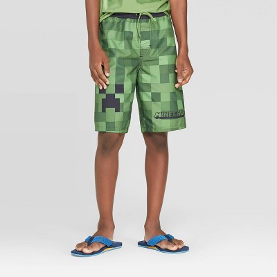 boys green swim trunks