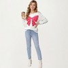 Anna-Kaci Women's Heart Bow Knit Sweater with Playful Graphic Design, Soft Crew Neck Fit and Cozy Long Sleeve Detailing - 3 of 4
