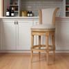 HomeRoots 30" Beige and Natural Fabric and Solid Wood Bar Height Swivel Bar Chair - 2 of 4