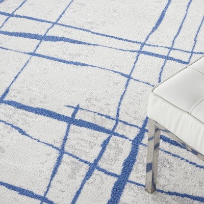 Whimsicle Blue and Ivory Abstract Round 8' Area Rug