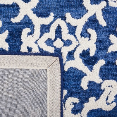 Ivory and Navy Hand Tufted Wool 4' x 6' Area Rug
