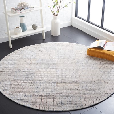 Handmade Ivory and Blue Wool Blend Abstract Area Rug, 5' x 8'