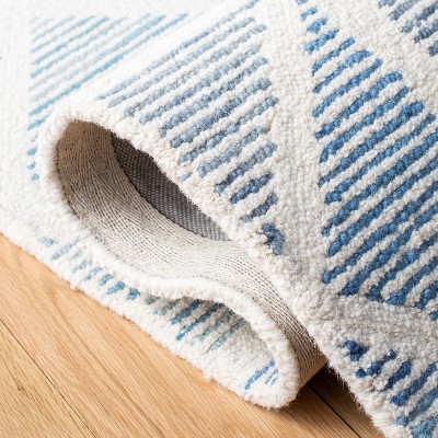 Hand-Tufted Blue and Ivory Wool Abstract Area Rug, 4' x 6'