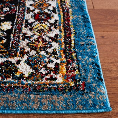 Vintage Blue and Black Synthetic Rectangular Area Rug 6'7" x 9'