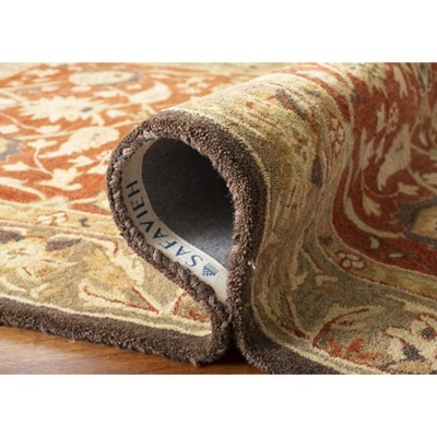 Handmade Rust and Green Wool Rectangular Area Rug 9'6" x 13'6"